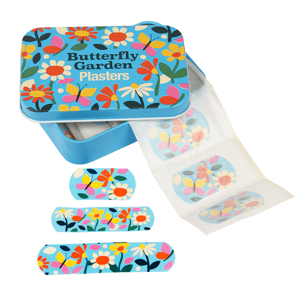 An open tin with butterfly plasters coming out of it. On The front of the tin there is a picture of butterfly's and flowers and infront of it there are 3 different sized butterfly plasters