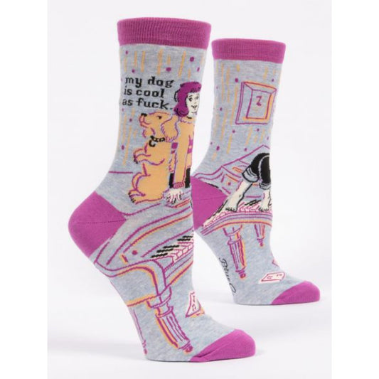 Grey and purple Blue Q socks with a picture of a girl, golden dog and a piano. The text reads: 'My dog is cool as fuck'