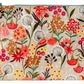 A beige Blue Q Zipper pouch with pink, red, orange and green flowers all over and white daffodils.