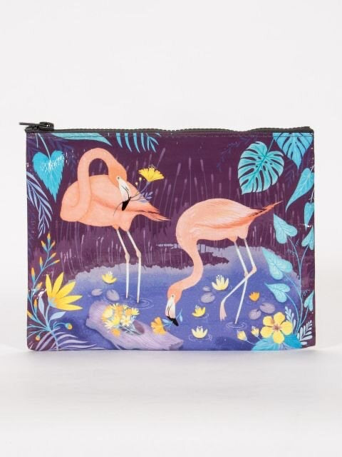 A purple Blue Q zipper pouch with 2 pink flamingos on the front that are standing in a lake with yellow flowers behind.